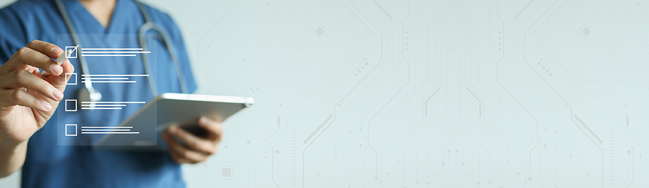 Provider writing on clear white board